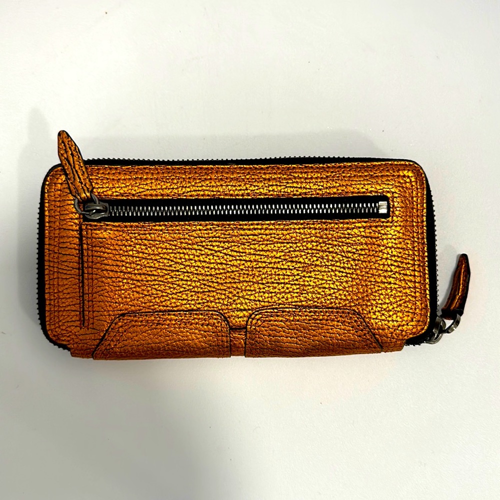 Phillip Lim orange metallic crackle leather wallet.